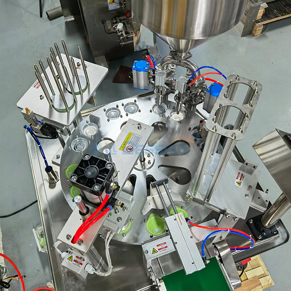 Small Automatic Honey Spoon/Ketchup/Sauce/Oil/Liquid/Lotion/Shampoo/Jelly/Liquid Soap/Juice/Tomato Paste Food Cup Packaging Packing Filling Sealing Machine